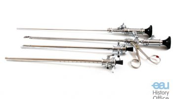 Irrigating cystoscope and biopsy forceps